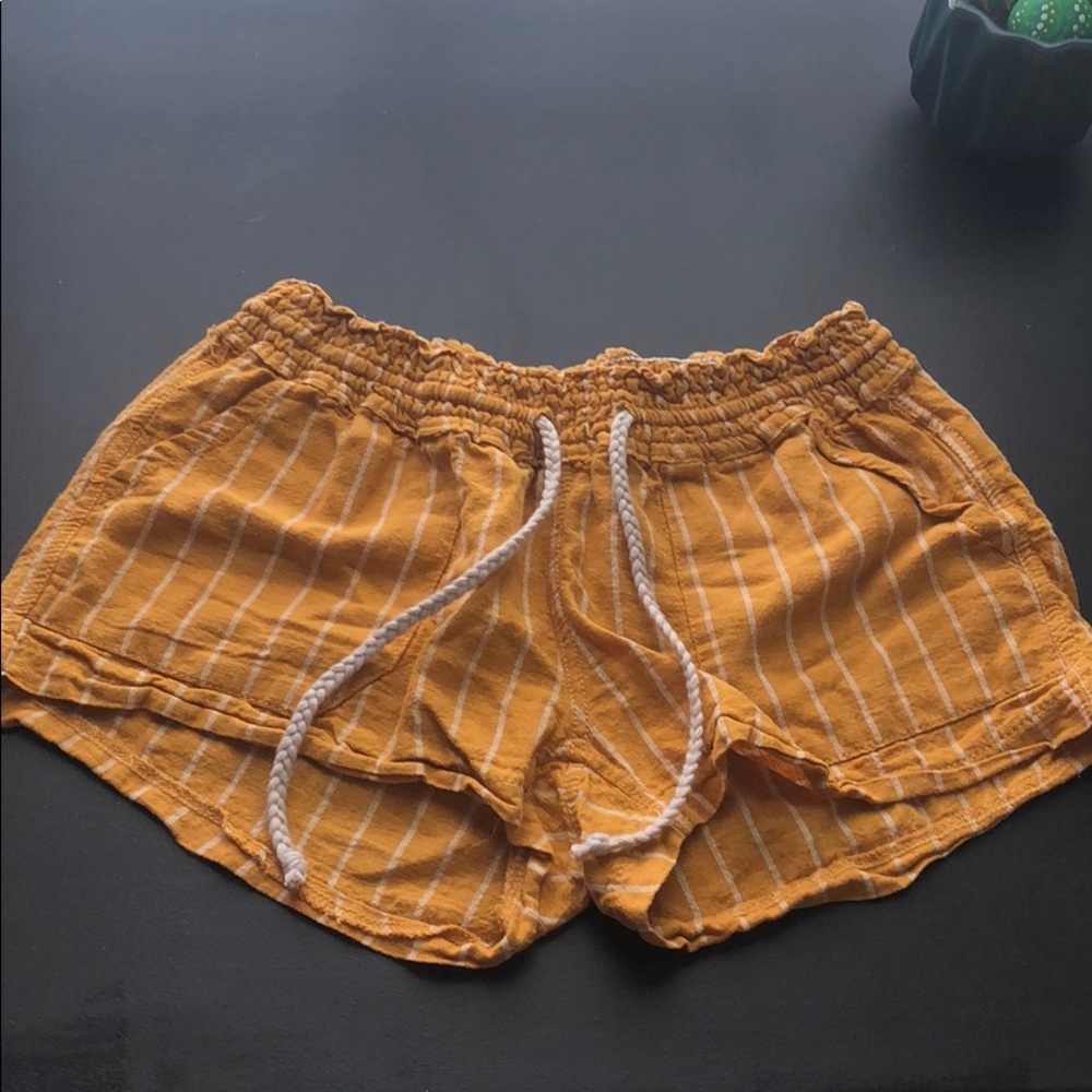 Women’s yellow and cream striped shorts